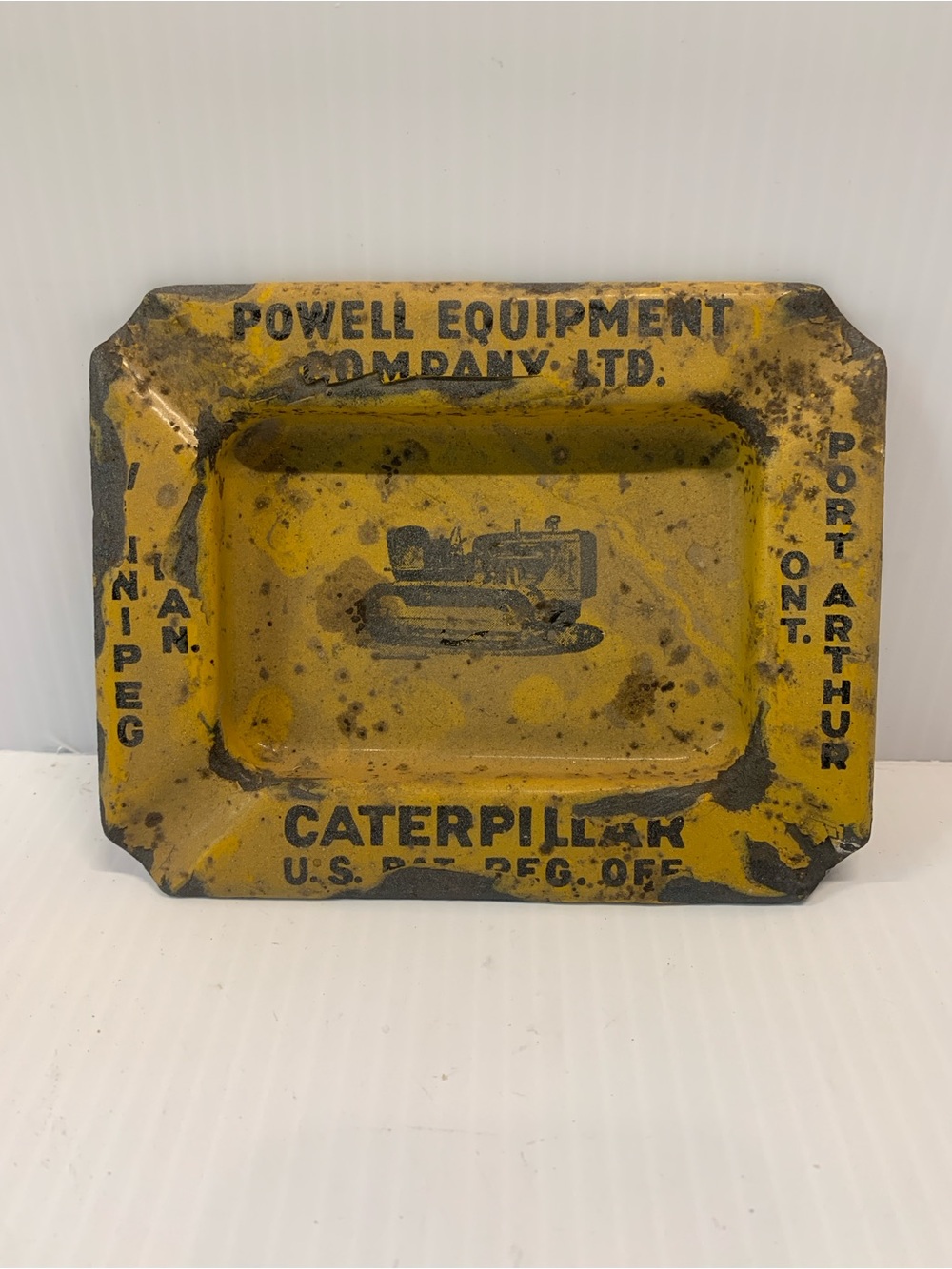 Caterpillar Yellow and Black Cast Metal Ashtray - Powell Equipment Co.